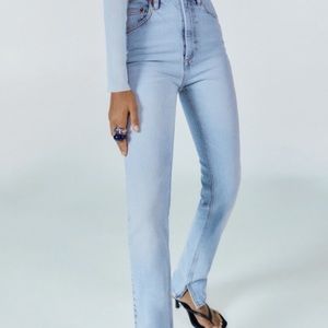 Hi rise slim jeans with split hems